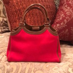Red and accent brown canvas Fossil purse